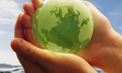 Imatge d'unes mans abraçant la Terra 
