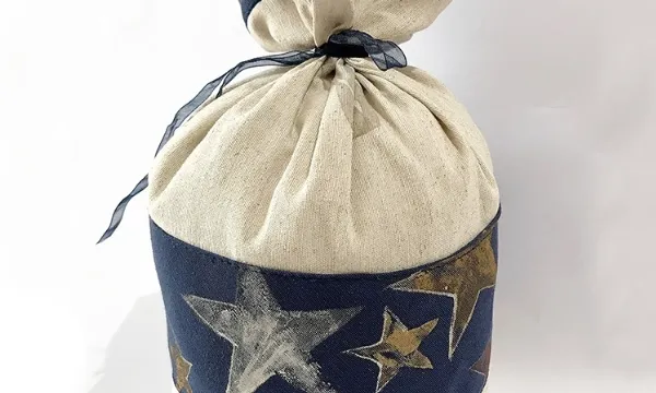 Saquet aguantaportes El Mercat Social