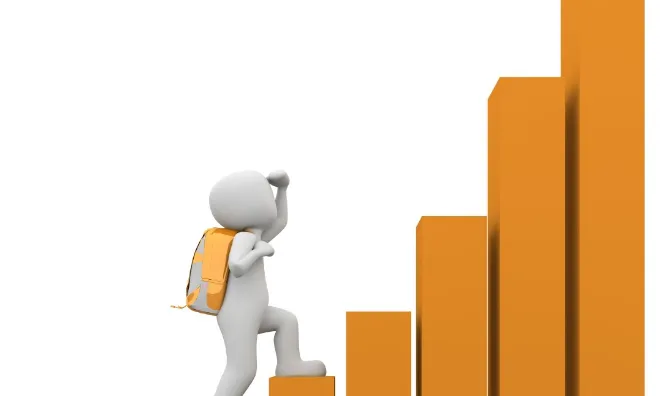 ninot pujant una escala econòmica