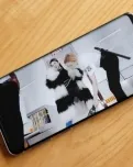 Fotografia d'un telèfon mòbil amb una fotografia. Imatge de Aaron Yoo. Llicència d'ús CC BY-ND 2.0.