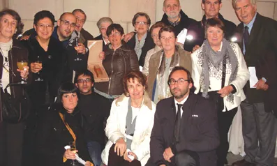 Centre d'Acollida Assís amb la Medalla d'honor de l'Ajuntament