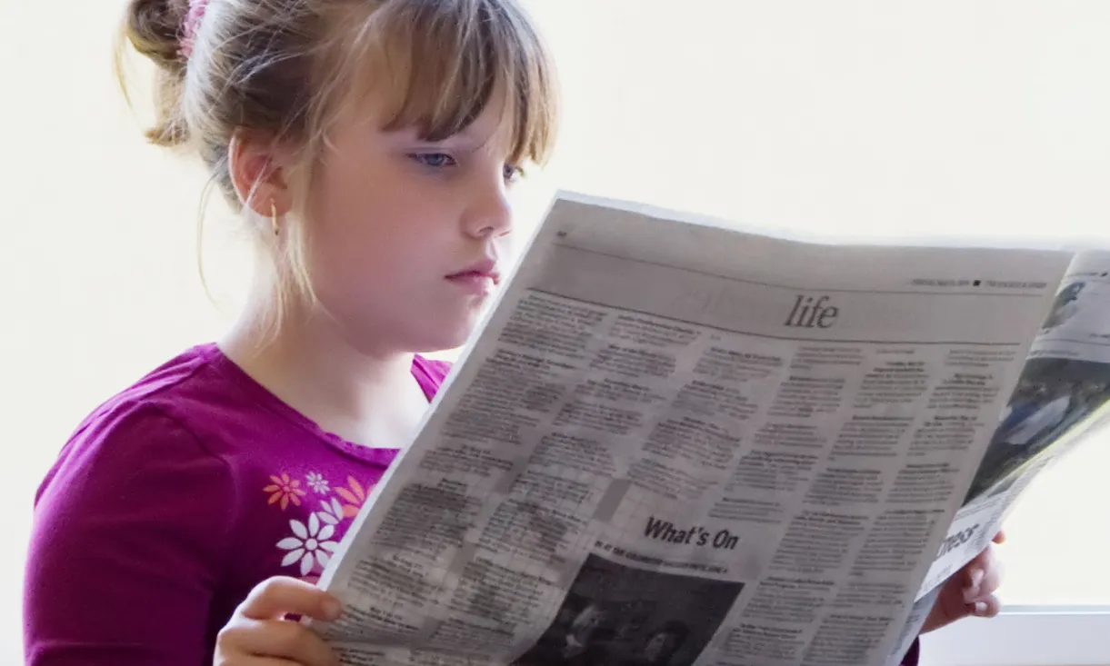 Nena llegit un diari