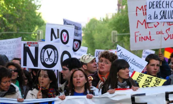 Protesta per una salut universal. Foto d'Amnistia Internacional