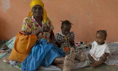 Família a Haití. Font: REUTERS