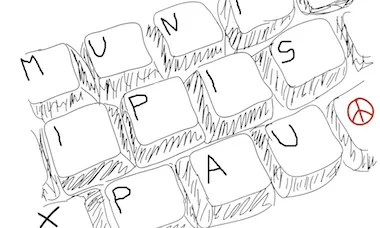 Imatge d'un teclat amb el text "Municipis per la Pau"