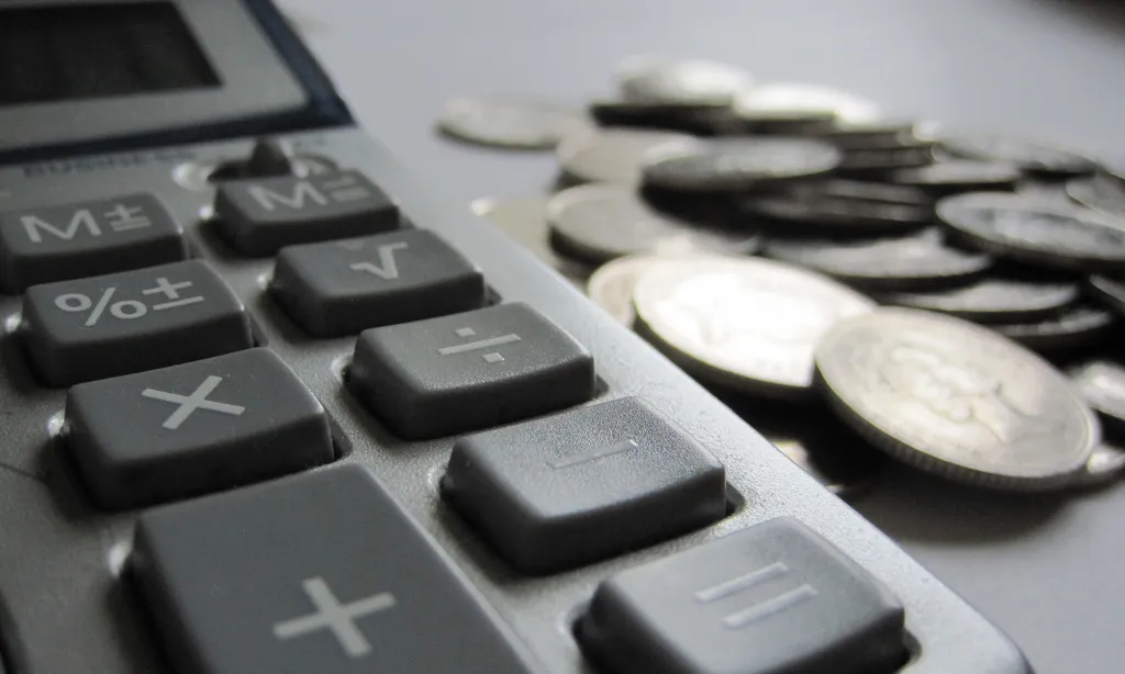 Calculadora amb monedes - Images_of_Money_ a Flickr