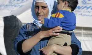 Sirians a un camp de refugiats de Jordània. ONU/Mark Garten