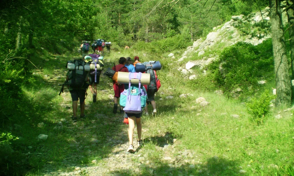 Campaments amb menors; Font:escoltesiguies.cat