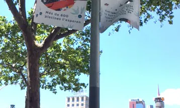 Imatge dels cartells penjats per Barcelona (Font: mullat.fem.es/)