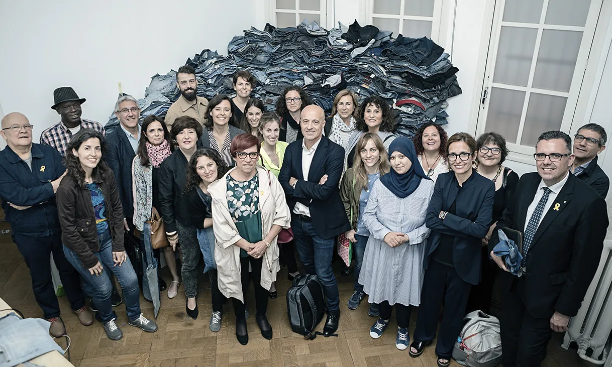 Equip de persones involucrades amb la marca de moda sostenible.