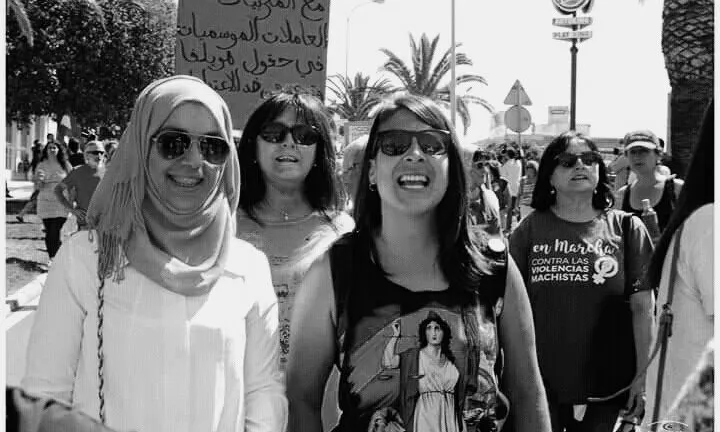 Temporeres de Huelva i membres del SAT en lluita.
