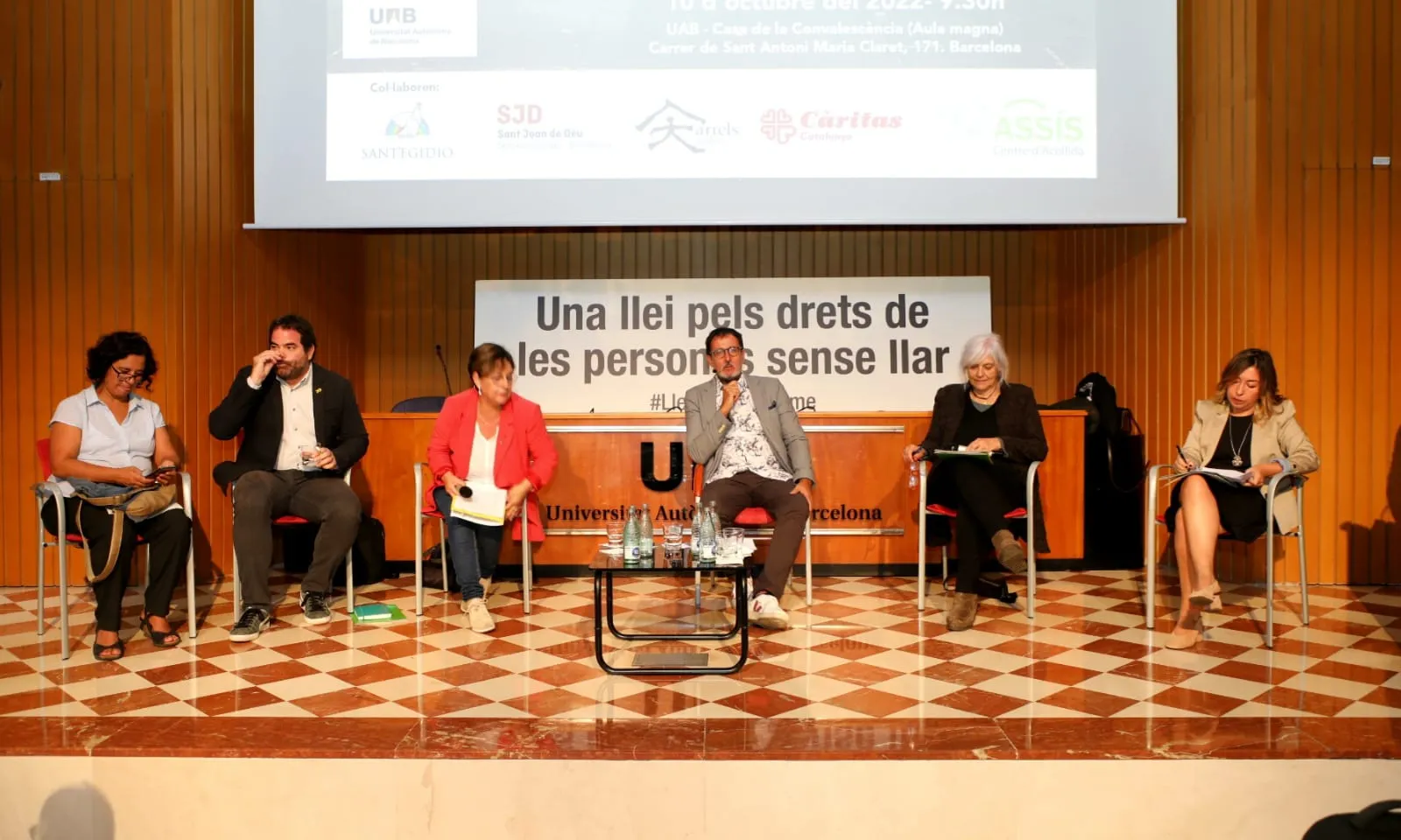 Representants dels grups polítics que donen suport a la proposta de llei, en un moment de la jornada.