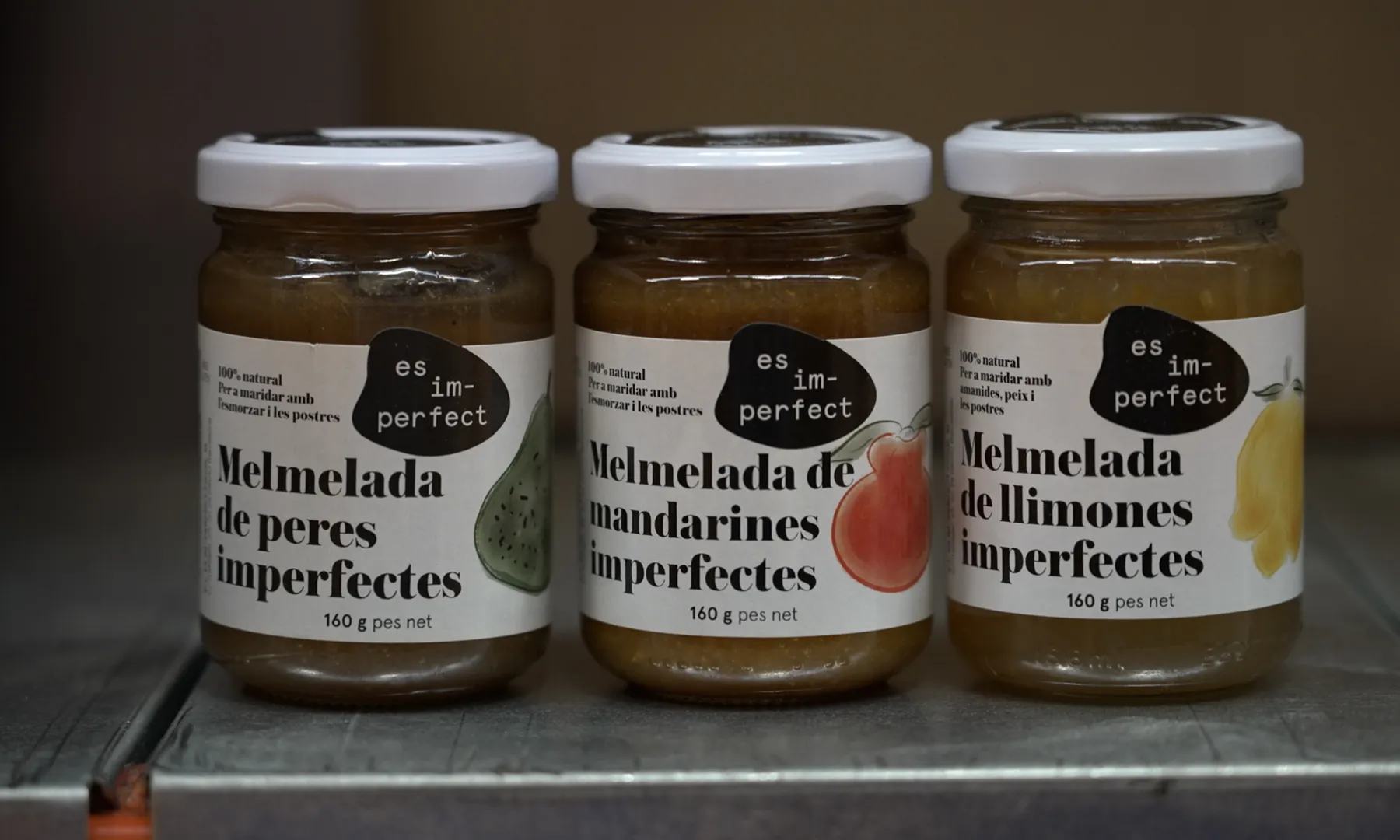 Tres pots de melmelada de fruites de la marca es im-perfect.