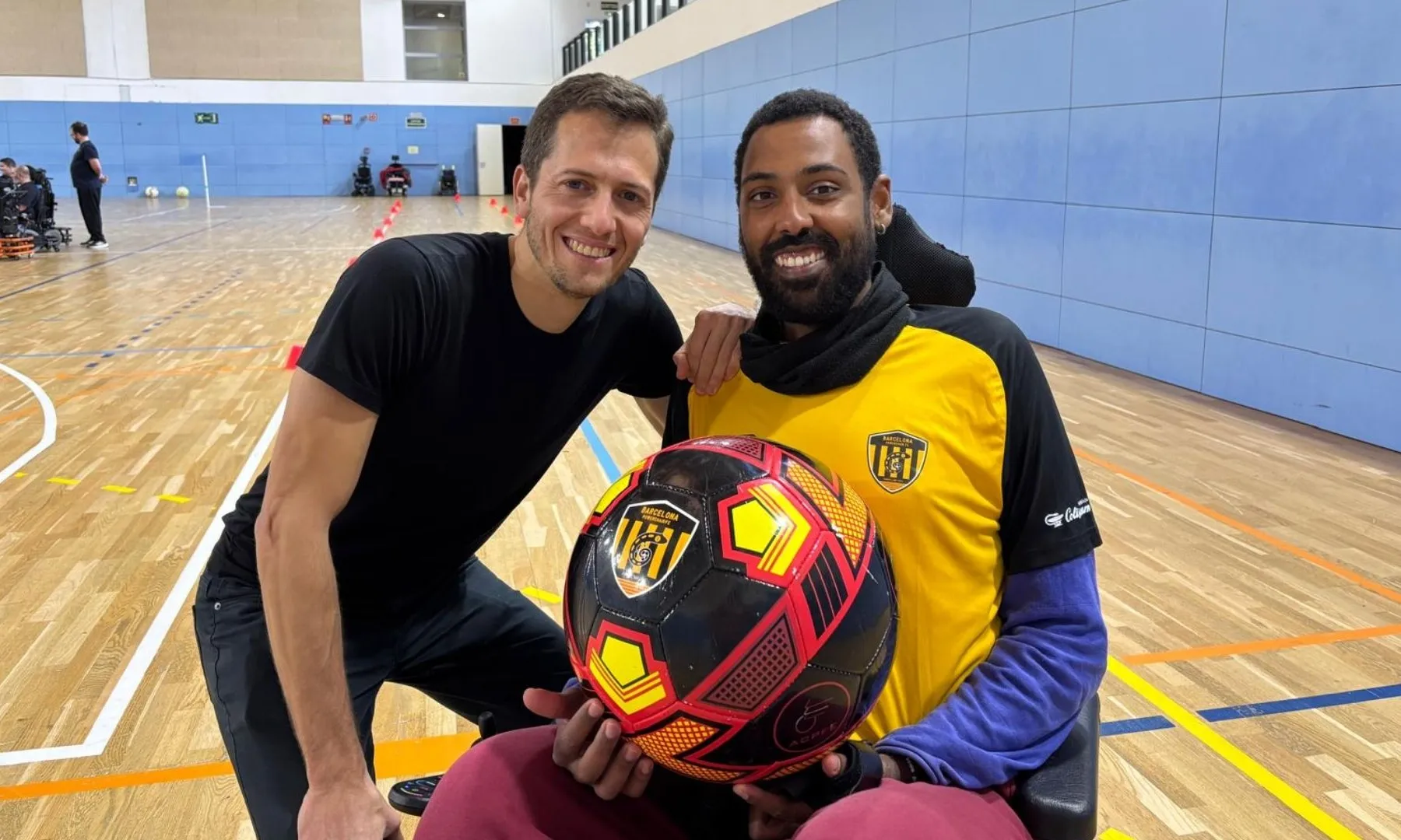 L'entrenador i el capità de l'equip.
