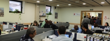 Oficines de Càritas de Barcelona on es reuneixen les persones usuàries amb els i les acompanyants Font: Càritas Diocesana de Barcelona