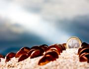 Muntanya de sorra amb monedes. Font: anieto2k (flickr.com)