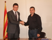El conseller de Justícia, Carles Mundó, i el president de la Taula, Oriol Illa, en la signatura de l'acord Font: 