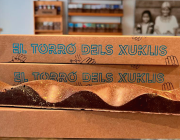 La pastisseria Cacau d'Olot fa nou anys que elabora un torró molt especial perquè les vendes serveixen per recollir fons per a l'AFANOC. Font: AFANOC