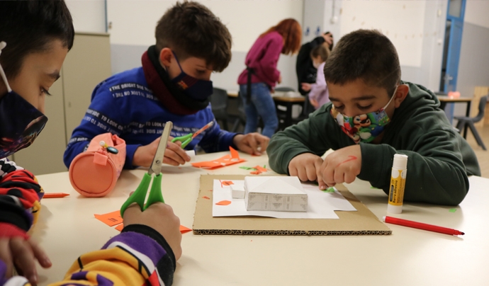 Procés participatiu de transformació i obertura del pati a la comunitat Font: Associació Casal Infantil La Mina
