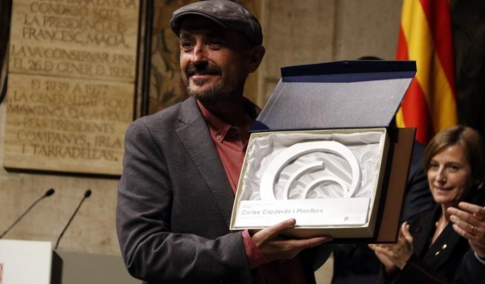 Carles Capdevila recollint el Premi Nacional de Comunicació Font: Manolo García
