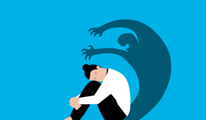 Una persona en soledat i una ombra que representa els problemes de salut mental, en una il·lustració. Font: Mohamed Hassan (Pixabay)