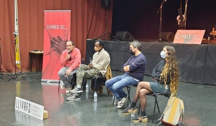 'Lliures' és una iniciativa d'Òmnium Cultural, Coop57 i les Entitats Catalanes d'Acció Social (ECAS). Font: Lliures