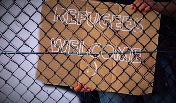Eslògan de benvinguda als refugiats Font: 