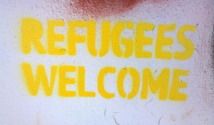 Pintada reivindicant l'acollida de persones refugiades. Font: http://concordeurope.org/ Font: 