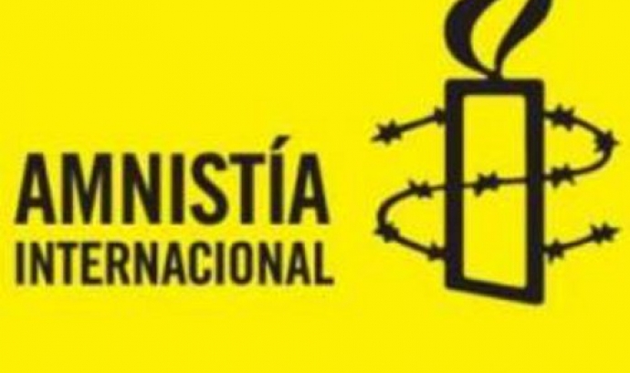 Logotip d'Amnstia Internacional